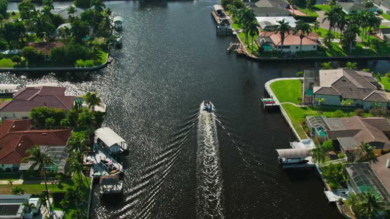Aerial view of Cape Coral, Florida water fronts out lining home in a very serene setting but prone to water damage by nature.