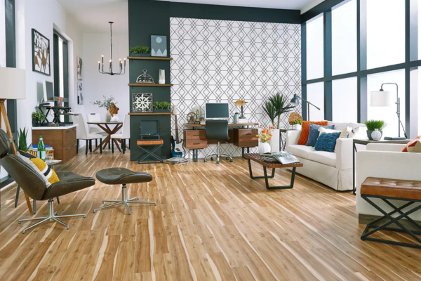 Bright and clean living room with laminate flooring, showing its stylish and affordable appeal.